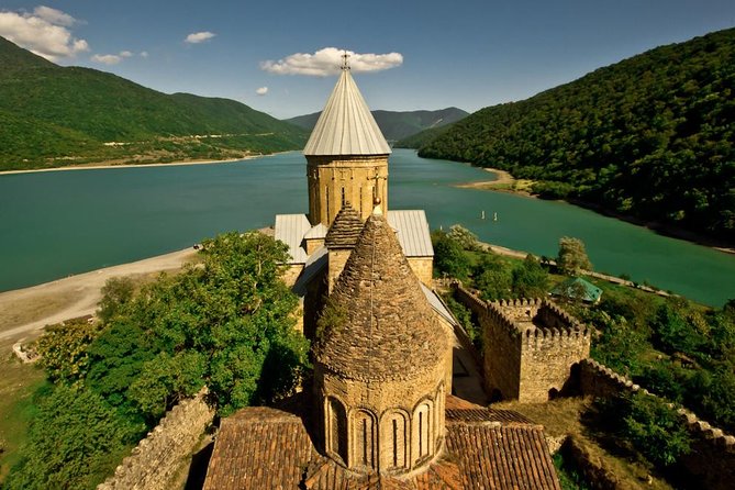 Caucasus mountains full day Private Tour Ananuri-Gudauri-Kazbegi - Ananuri Fortress, walls above the old road