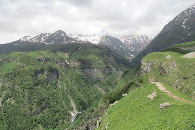 Caucasus mountains full day Private Tour Ananuri-Gudauri-Kazbegi - Zhinvali Reservoir and the city beneath the water