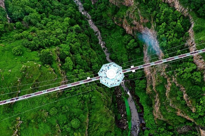 Dashbashi Canyon, Glass Bridge, Bicycle Zip Line, Swing, Private Full Day Tour - Crossing the glass bridge above the gorge
