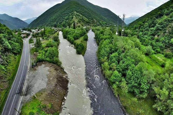 Day tour to mountains Jinvali lake, Ananuri, Kazbegi, Arch friendship - Kazbegi and Gergeti Trinity Church
