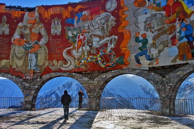 Kazbegi Adventure - Private Day Trip From Tbilisi with a Dinner + Masterclass - Gudauri Friendship Monument: Soviet color above the highway