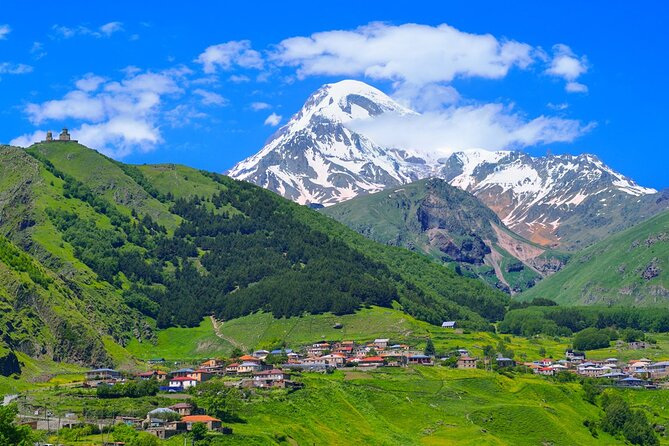 Kazbegi Full-Day Private Tour with Scenic Stops from Tbilisi - Zhinvali Reservoir, blue water below the highway