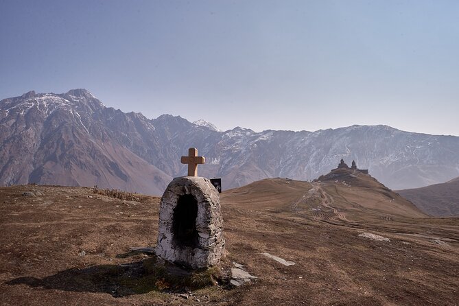 Private day trip to the Caucasus mountains and the Russian border - Ananuri begins the day with stone and water