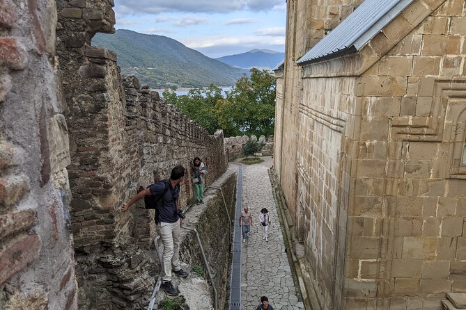 Private Full Day Trip to Kazbegi Mountains - The Russia-Georgia Friendship Monument on the cliff